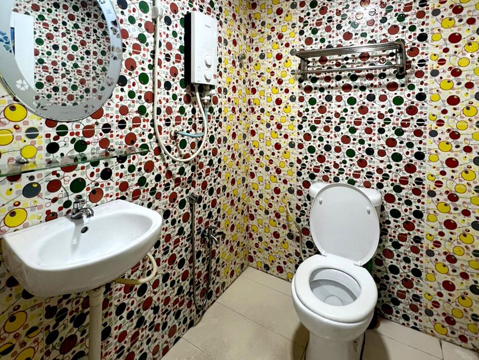 Exclusive Double Room | Bathroom | Shower, slippers, towels, soap