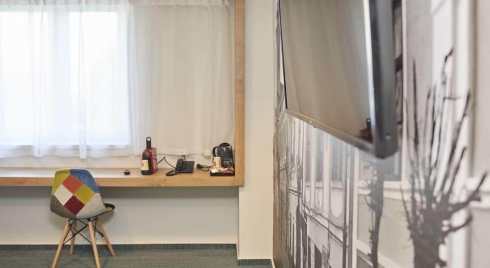 Deluxe Double Room | Minibar, in-room safe, iron/ironing board, free WiFi