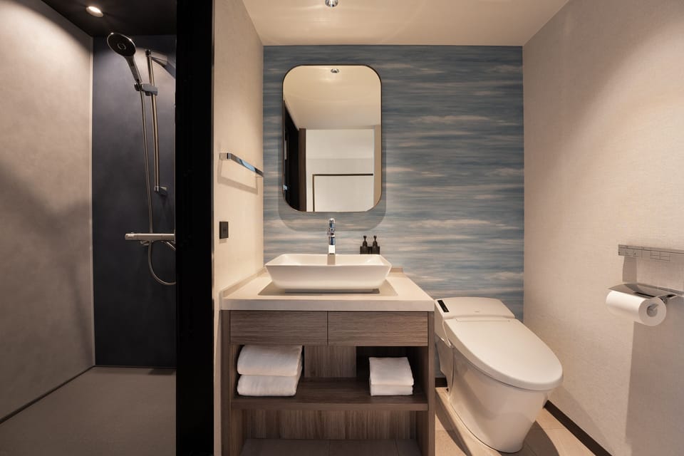 Superior Room, 2 Twin Beds (1 Single Extra Bed. City Side) | Bathroom | Hair dryer, slippers, electronic bidet, towels