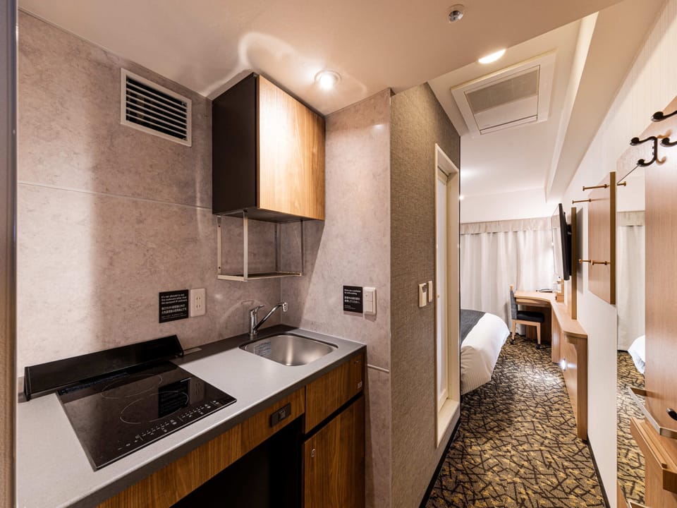 King Room (with kitchenette), Non Smoking  | Down comforters, desk, free WiFi, bed sheets