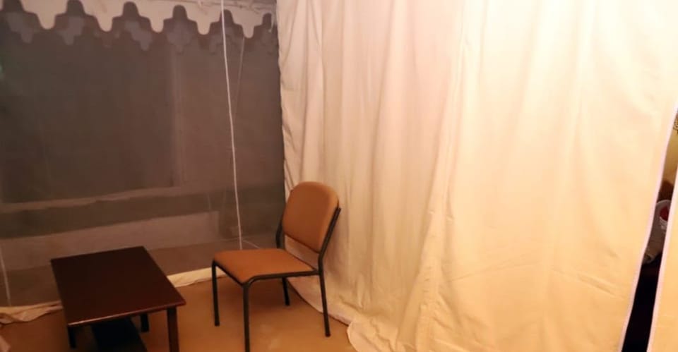Swiss Non Ac Tent | Individually furnished, desk, laptop workspace, bed sheets