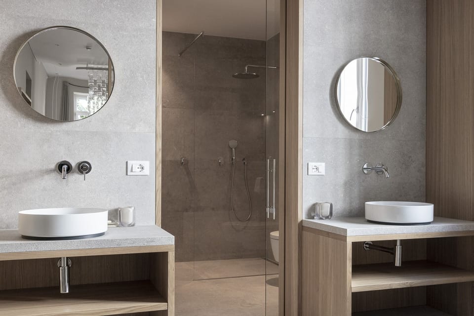 Design Studio Suite | Bathroom | Eco-friendly toiletries, hair dryer, bathrobes, slippers
