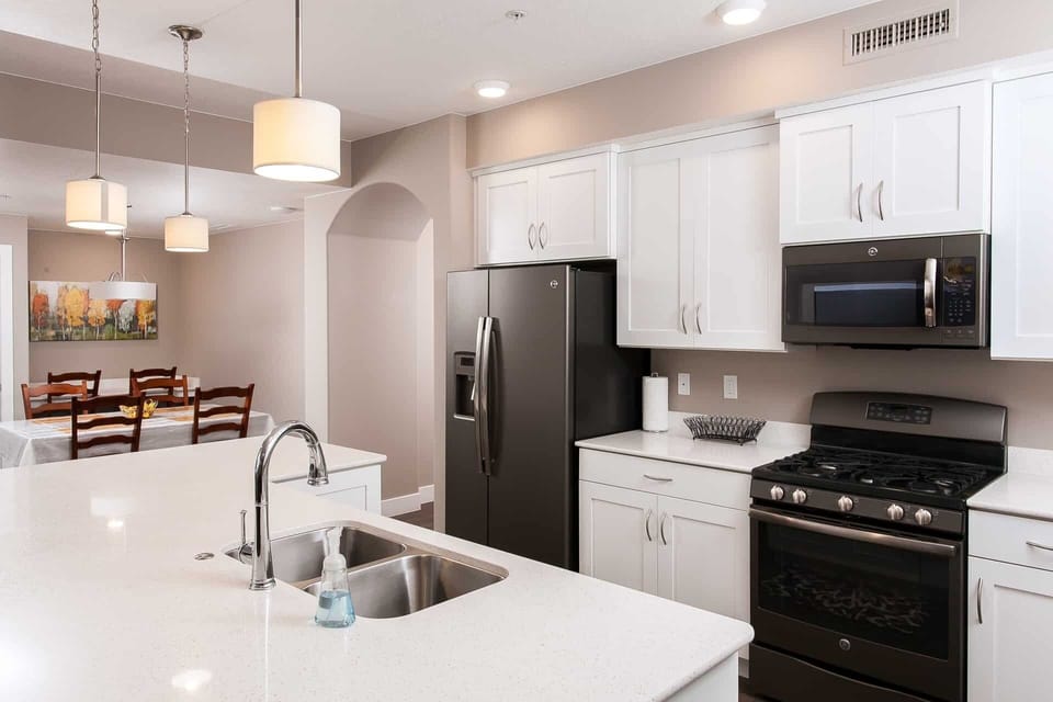 Condo, 3 Bedrooms | Private kitchen | Fridge, microwave, oven, coffee/tea maker