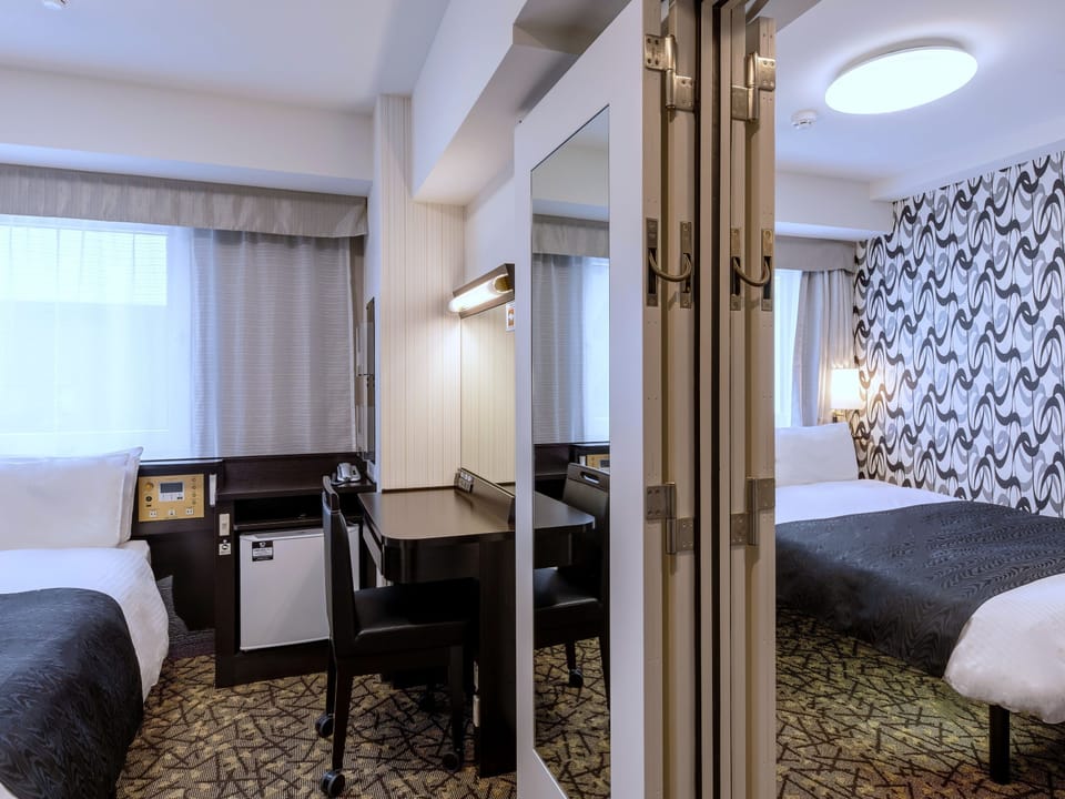 Down comforters, desk, blackout drapes, free WiFi