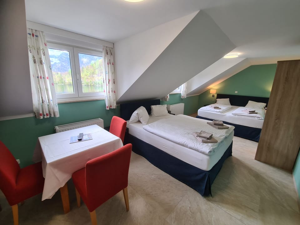 Premium bedding, desk, laptop workspace, iron/ironing board