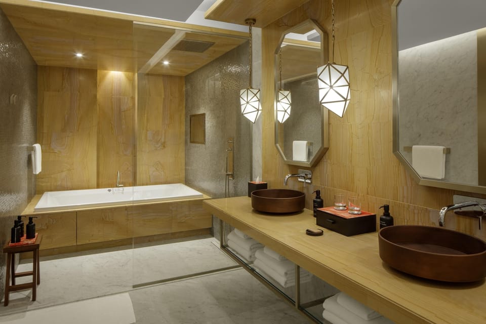 Suite (Prince) | Bathroom | Separate tub and shower, rainfall showerhead, designer toiletries