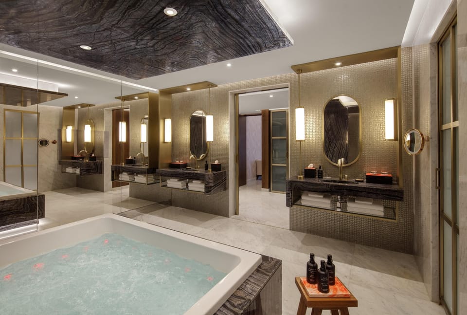 Royal Suite, 2 Bedrooms | Bathroom | Separate tub and shower, rainfall showerhead, designer toiletries