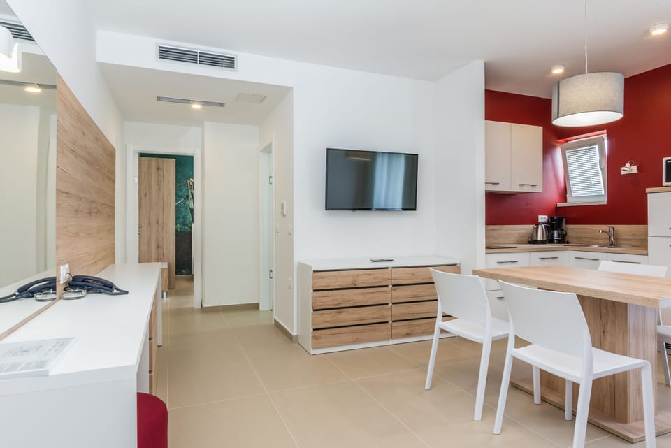 Standard Apartment, 1 Bedroom, Balcony, Beachfront | Living area | LED TV