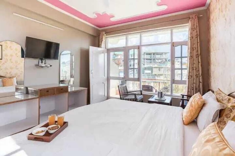Classic Double Room | Pillowtop beds, in-room safe, iron/ironing board, free WiFi