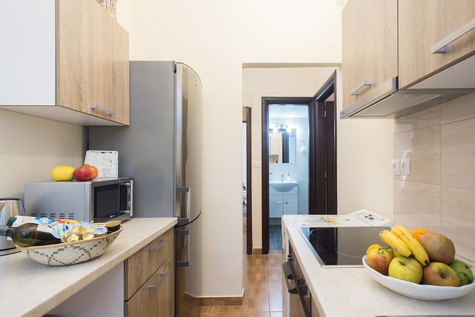 Apartment | Private kitchen | Full-size fridge, microwave, oven, stovetop