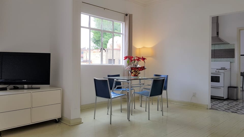 Business Studio Suite | Down comforters, in-room safe, individually decorated