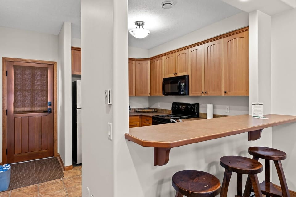 Townhome, 2 Bedrooms | Private kitchen | Fridge, microwave, stovetop, dishwasher