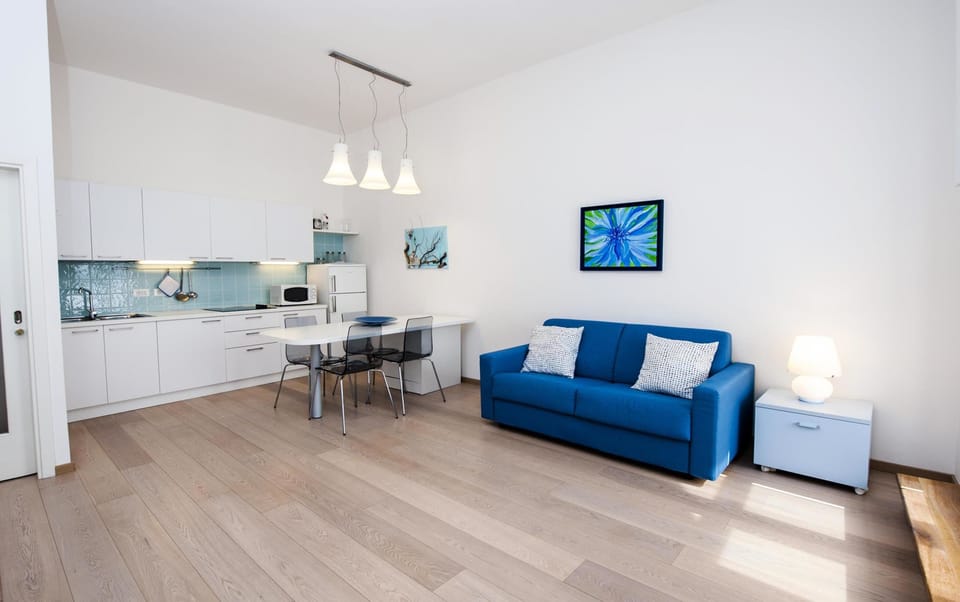 Apartment, 1 Bedroom, Sea View | Living area | 40-inch TV with cable channels
