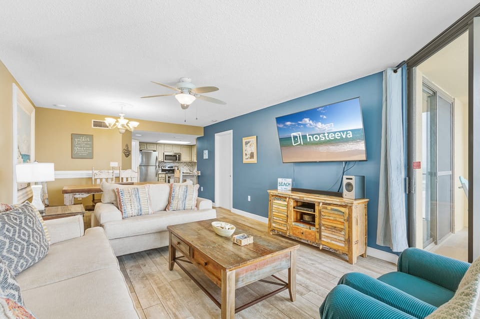 Signature Condo, 2 Bedrooms, Balcony | Living room | 65-inch flat-screen TV with cable channels, TV, Netflix