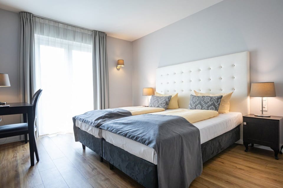 Double Room | Minibar, in-room safe, desk, soundproofing