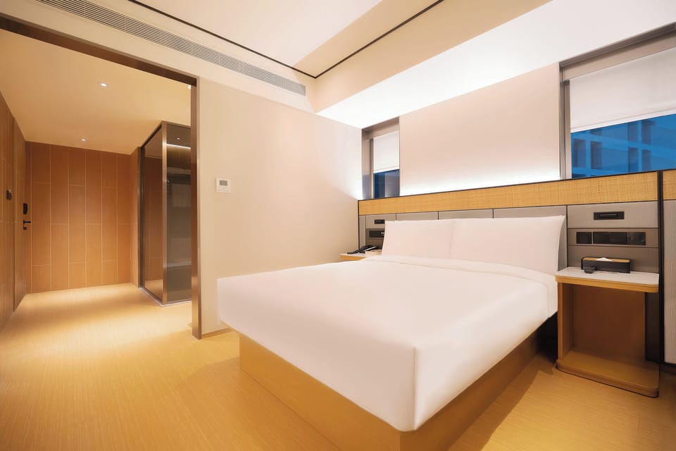Deluxe Double Room | Minibar, desk, blackout drapes, iron/ironing board (on request)