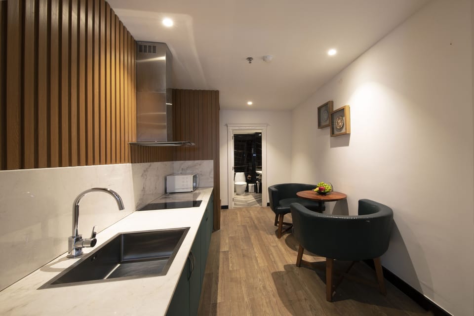 Premier Suite with Kitchenette, Afternoon Tea | Minibar, in-room safe, desk, blackout drapes