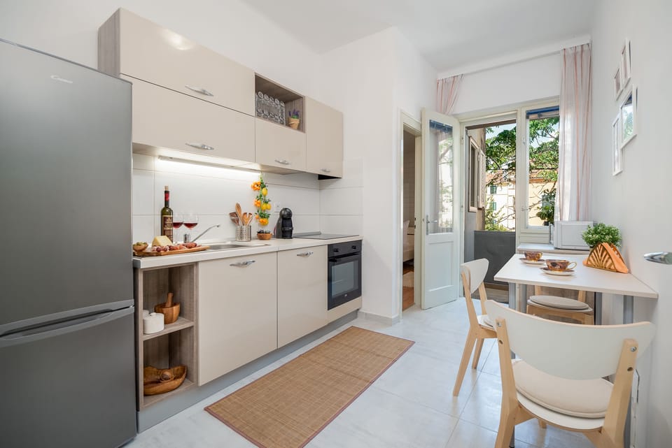 Classic Apartment, Balcony | Private kitchen | Full-size fridge, microwave, oven, stovetop