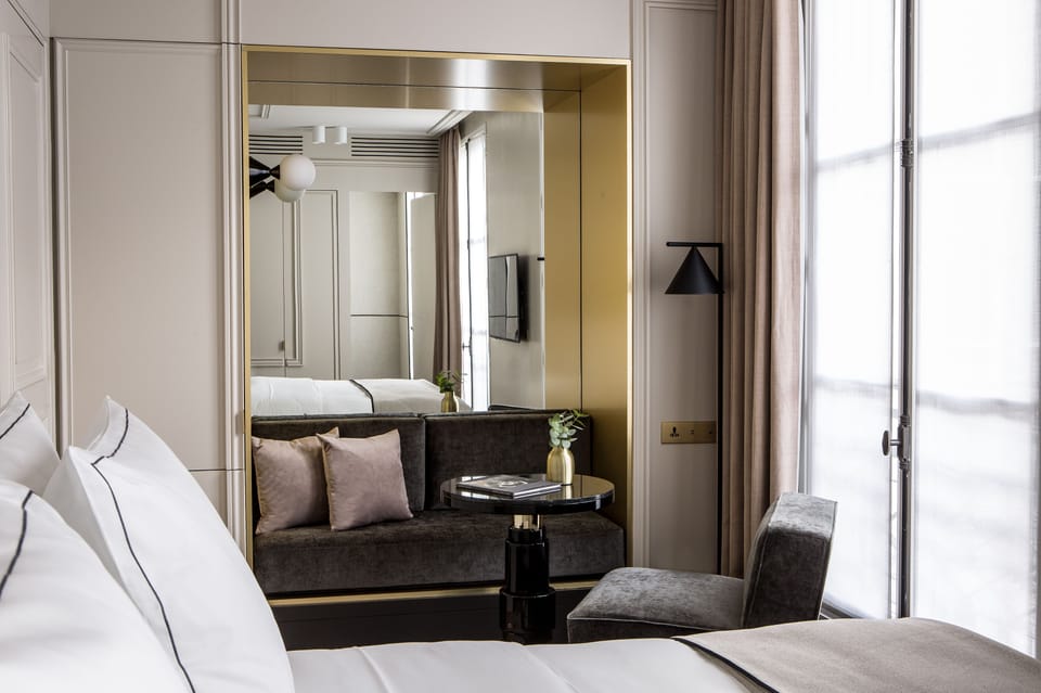 Deluxe Double Room | Minibar, in-room safe, desk, blackout drapes