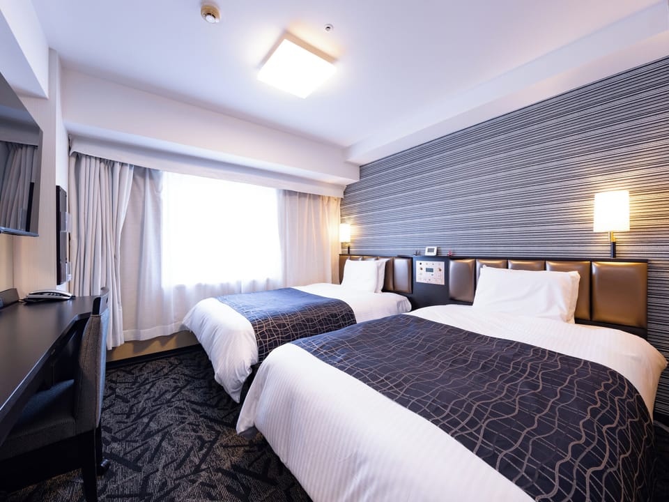 Down comforters, desk, blackout drapes, free WiFi