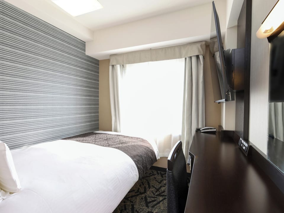 Down comforters, desk, blackout drapes, free WiFi