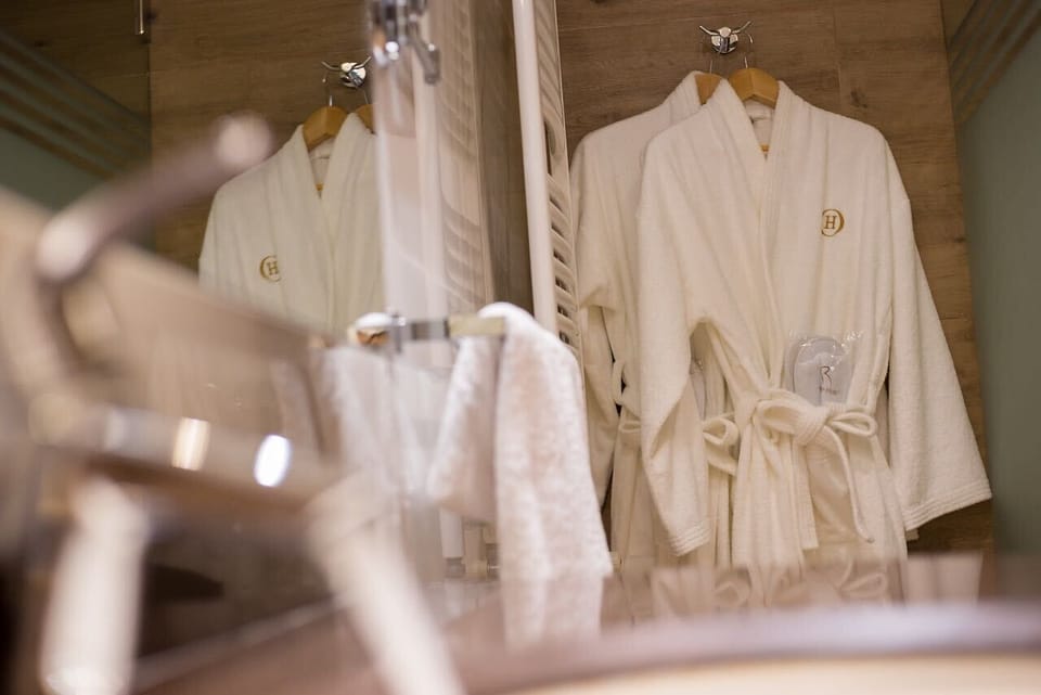 Jetted tub, slippers, towels