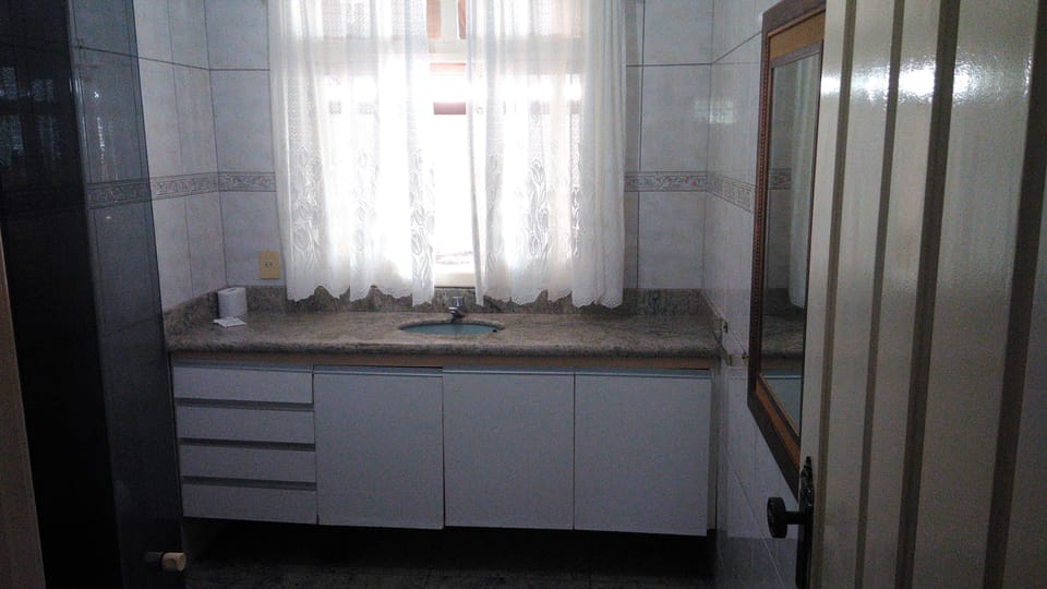 Deluxe Room | Bathroom | Shower, towels, soap