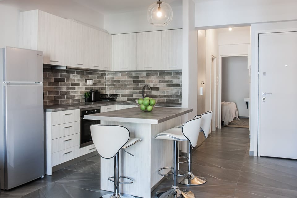 Apartment, 1 Bedroom, City View | Private kitchen | Full-size fridge, oven, stovetop, espresso maker