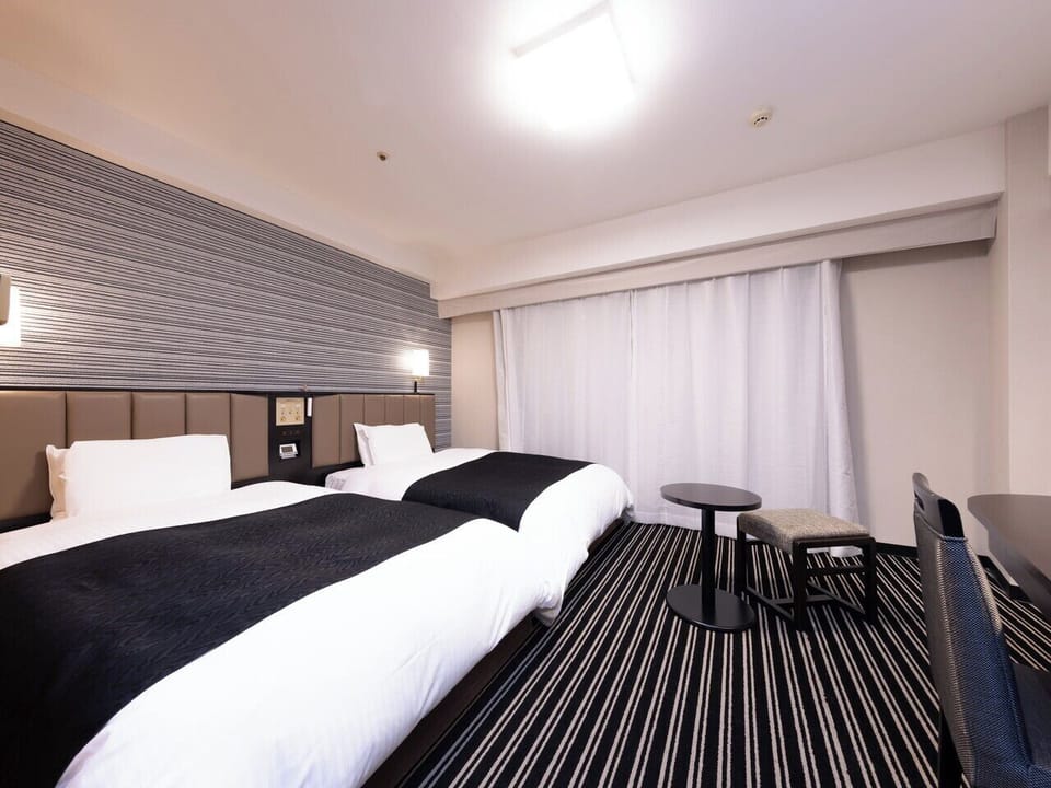 Down comforters, desk, blackout drapes, soundproofing