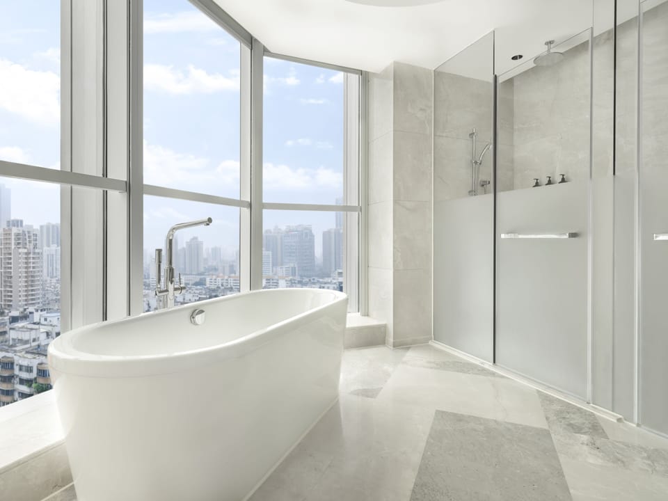 Separate tub and shower, deep soaking tub, rainfall showerhead