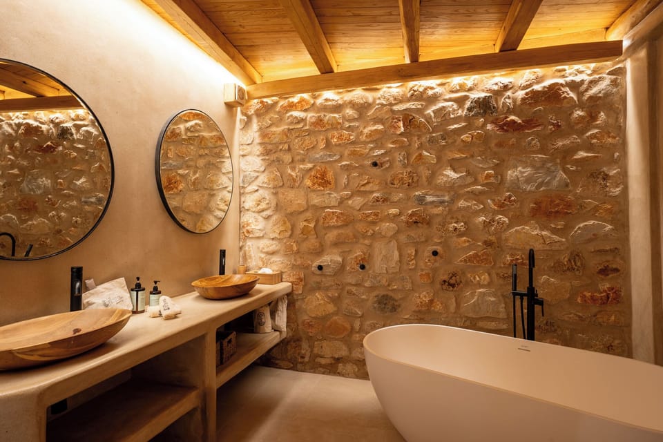 Majesty Suite with Outdoor Hot Tub | Bathroom | Designer toiletries, hair dryer, slippers, towels
