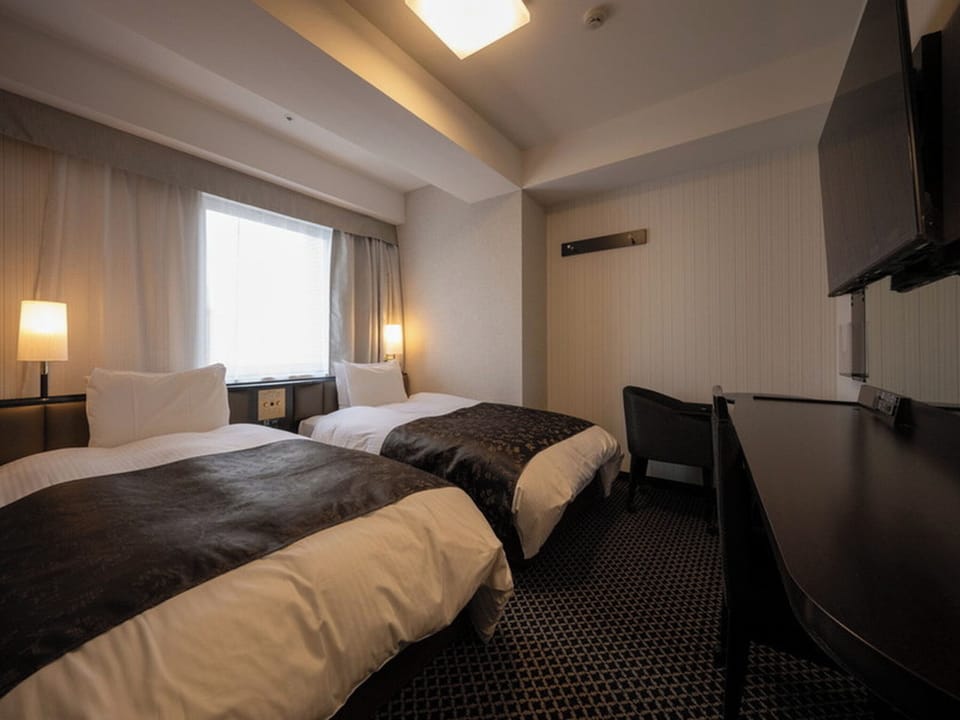 Desk, blackout drapes, WiFi (free), bed sheets