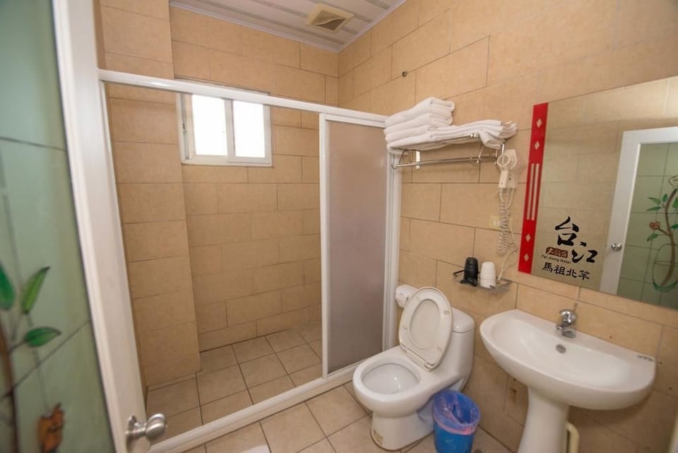 Shower, free toiletries, hair dryer, slippers