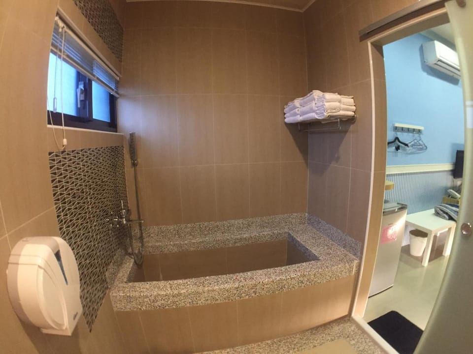 Shower, free toiletries, hair dryer, slippers