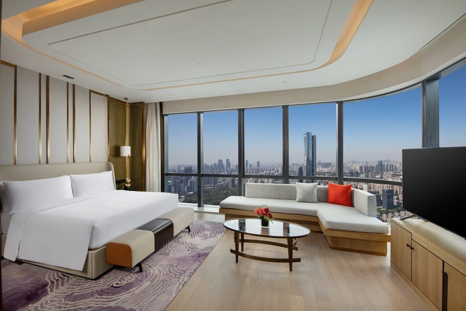 Presidential Suite, Club Lounge Access | Minibar, in-room safe, individually decorated, desk