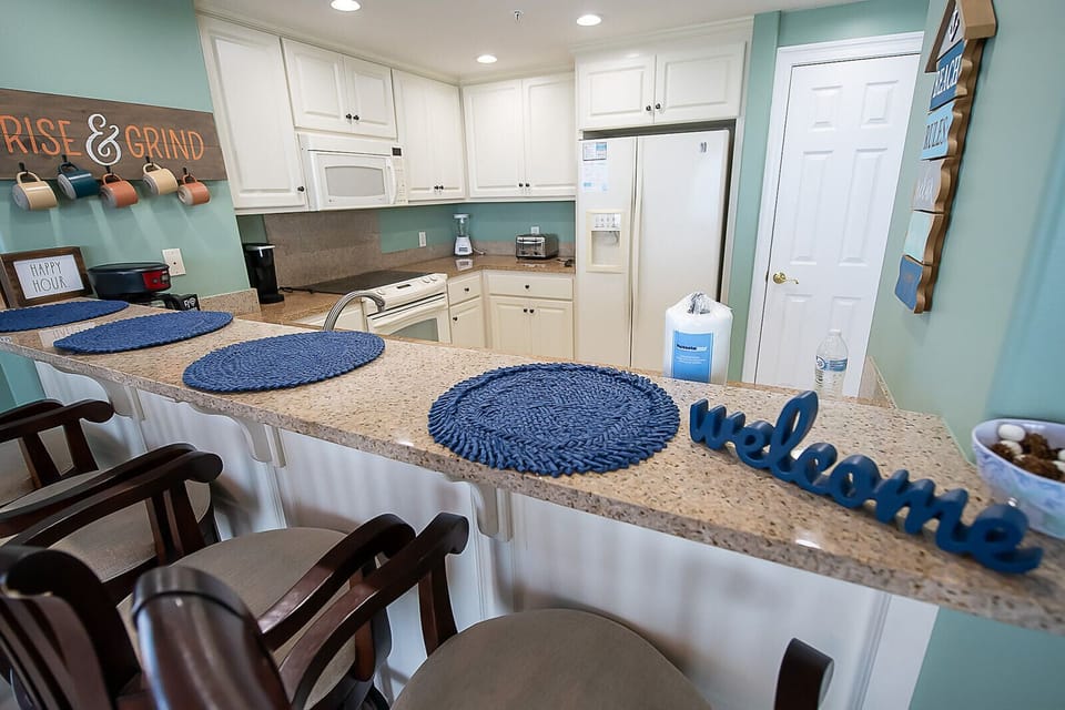 Condo, Multiple Beds, Balcony, Ocean View | Private kitchen | Fridge, microwave, oven, stovetop