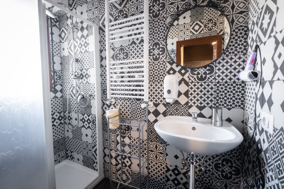 Classic Single Room | Bathroom | Shower, hair dryer, towels, soap