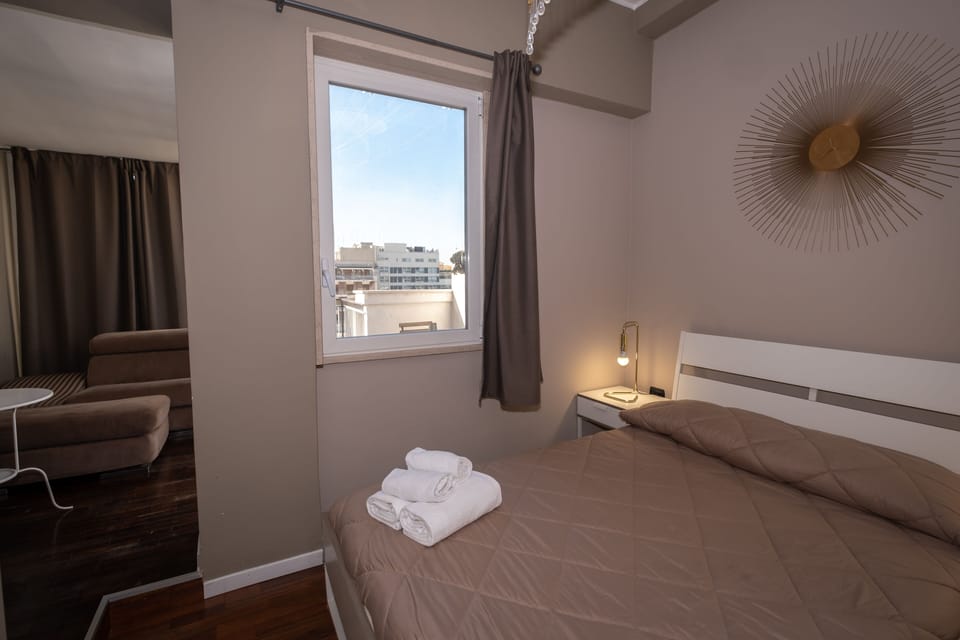 Premium bedding, down comforters, desk, laptop workspace
