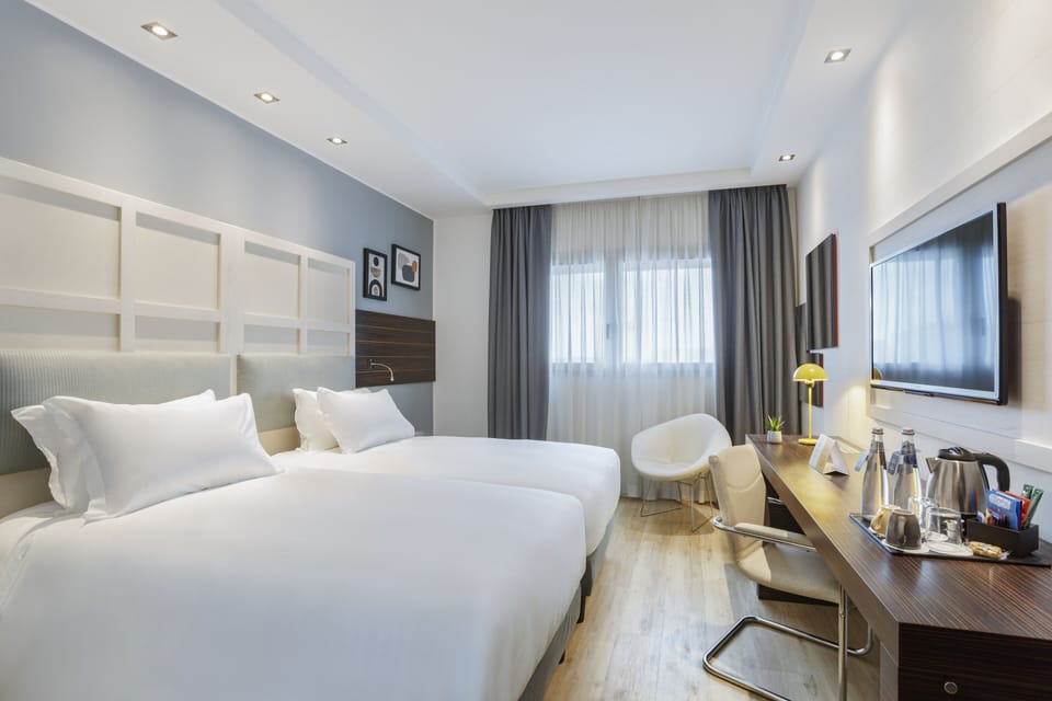 Standard Room, 2 Twin Beds | Premium bedding, down comforters, minibar, in-room safe