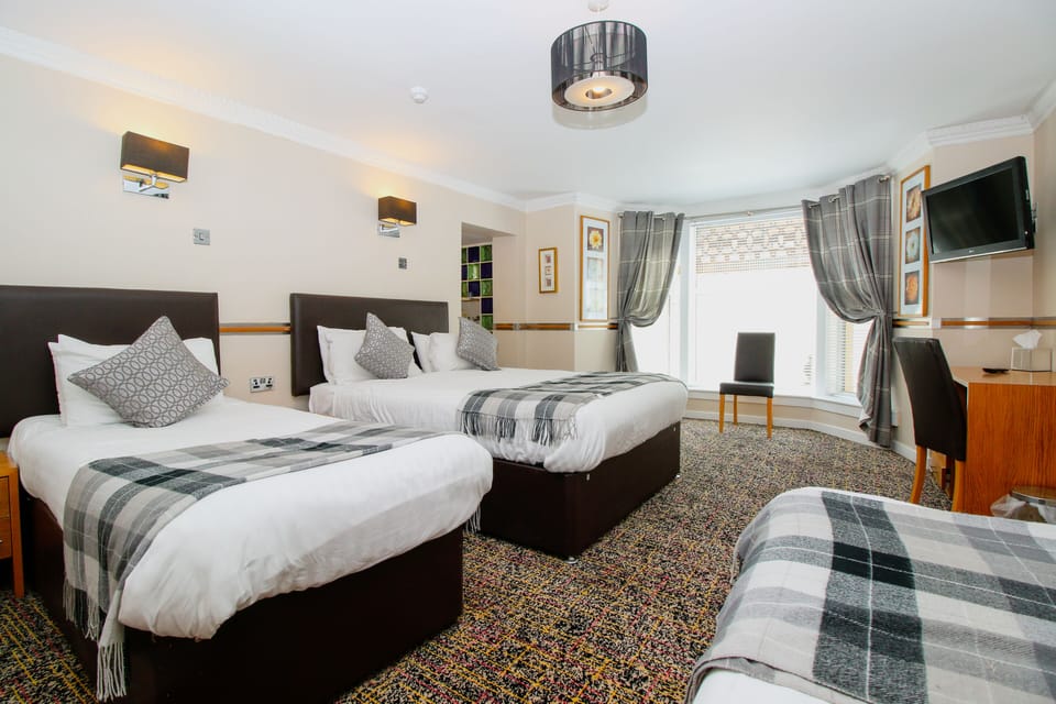 Family Room | Desk, iron/ironing board, cribs/infant beds, free WiFi