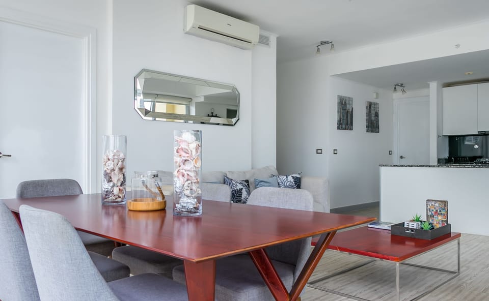 Deluxe Apartment, 2 Bedrooms | Living area | 55-inch Smart TV with cable channels, TV