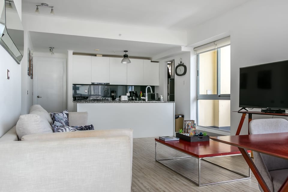 Deluxe Apartment, 2 Bedrooms | Living area | 55-inch Smart TV with cable channels, TV
