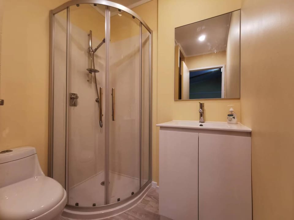 Studio Unit 2A with Single Person Tub | Bathroom | Shower, free toiletries, towels, soap