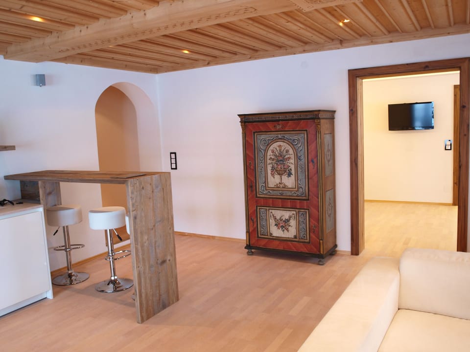 Luxury Apartment | Living area | TV, iPod dock