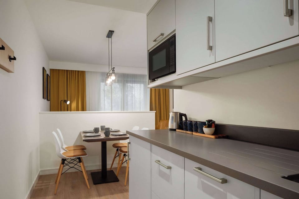 Apartment, Multiple Beds | Desk, laptop workspace, blackout drapes, iron/ironing board (on request)