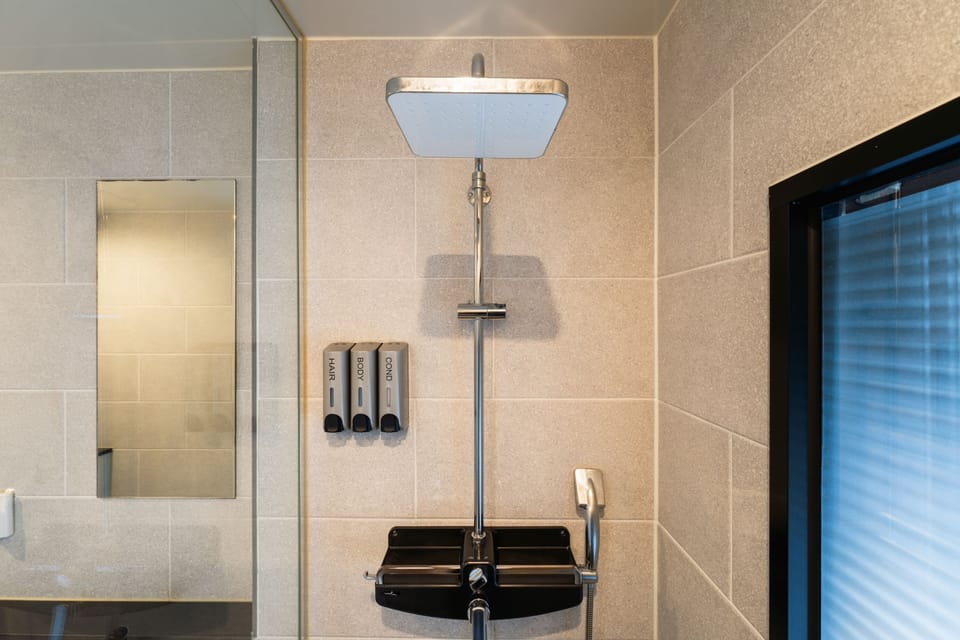 Shower, hair dryer, bathrobes, slippers