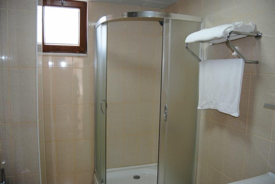 Shower, free toiletries, hair dryer, towels