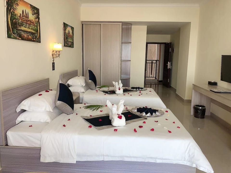 Deluxe Room (with One-way Airport Pick up) | Minibar, in-room safe, individually decorated, individually furnished