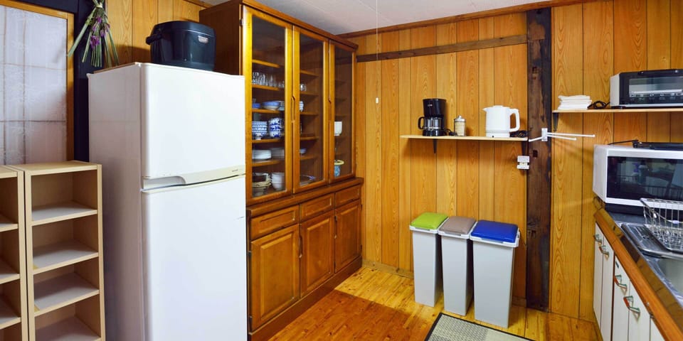Vacation Home | Private kitchen | Coffee/tea maker, full-size fridge, microwave, oven
