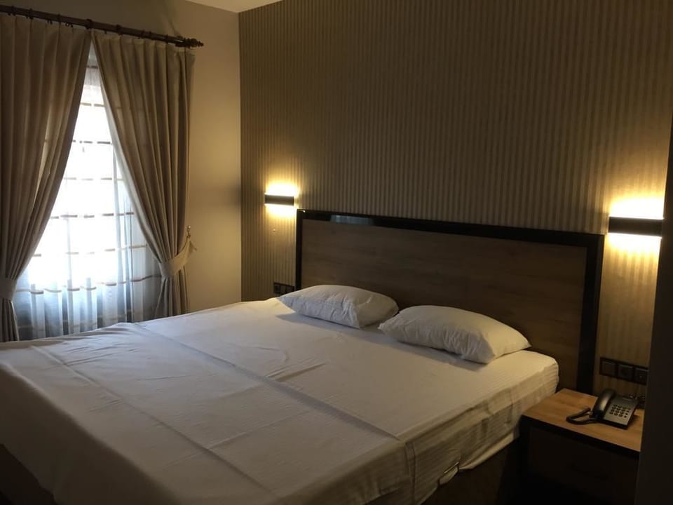 Egyptian cotton sheets, premium bedding, desk, laptop workspace